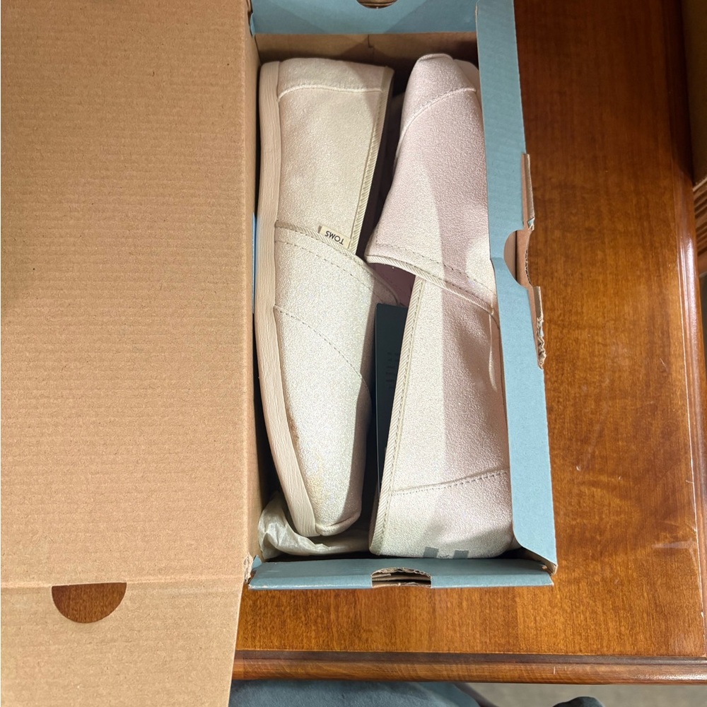 TOMS Off-White Canvas Slip-Ons
